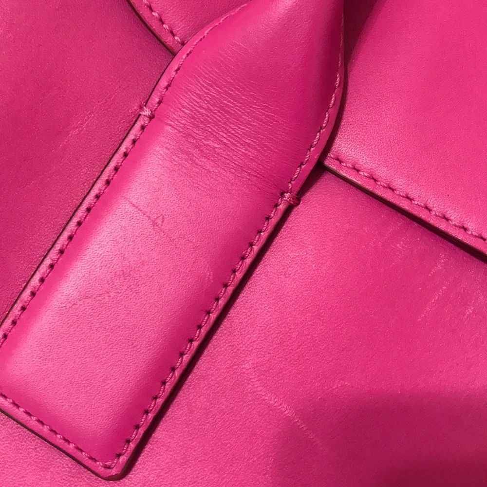Not for sale! Close up of kate spade hot pink bag.
